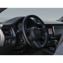Steering wheel detail of a premium vehicle for professional interior retouching.