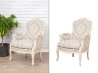 Cutout of a white fabric armchair with background removal for an online furniture store.