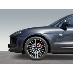 Wheel and side detail of a black high-end car for professional vehicle image editing.