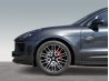 Wheel and side detail of a black high-end car for professional vehicle image editing.