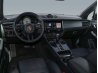 Front interior of a black premium vehicle for professional car photo editing.